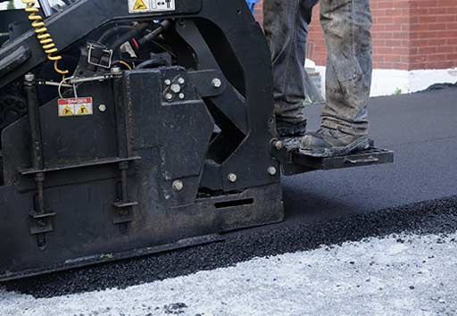 Asphalte condo Greenfield Park stationnement